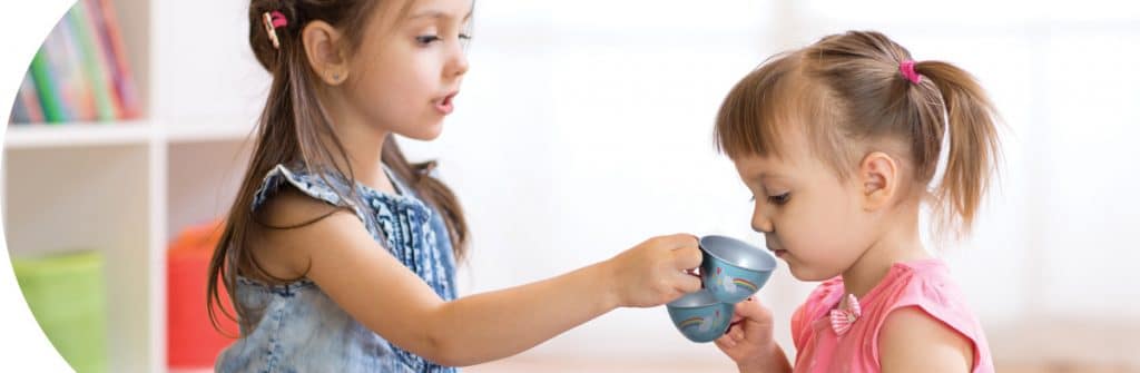 Tea Sets - Girls playing with Unicorn Tin Tea Set
