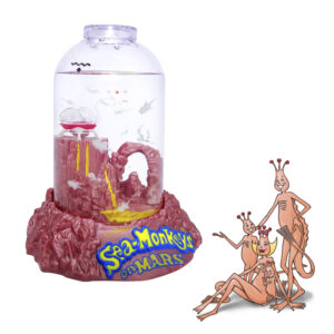 The aquarium is out of the package with Sea-Monkeys swimming in the water inside. A family of four illustrated Sea-Monkeys are in front of the product. They are illustrations from the 1970's.